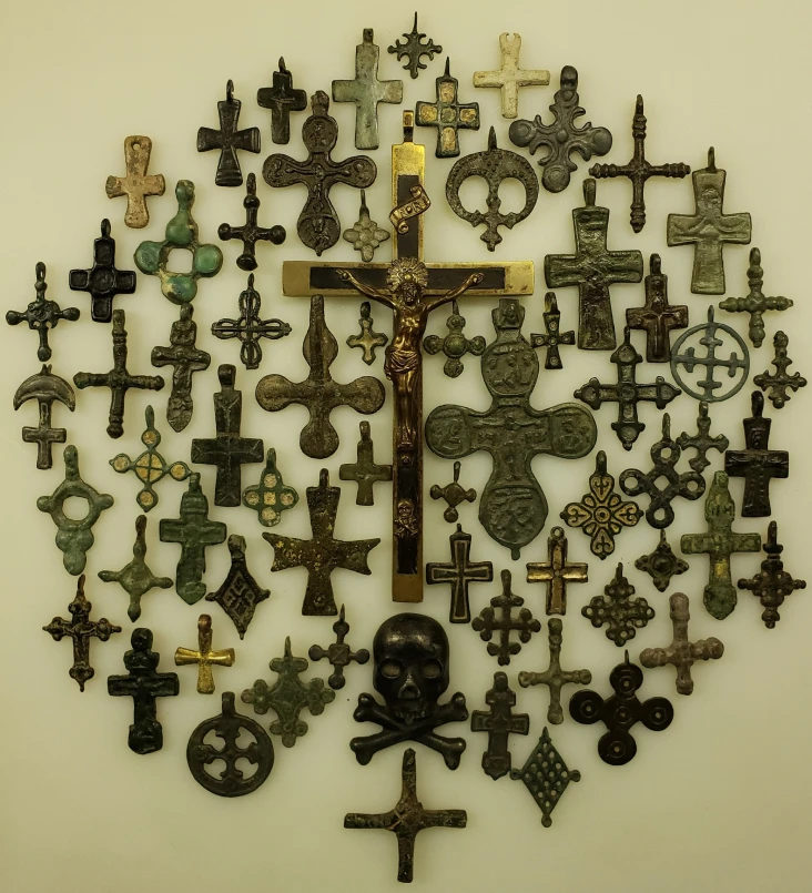 Assorted decorative crosses displayed